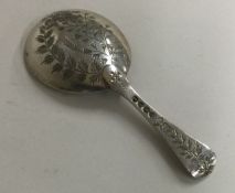 An attractive Victorian aesthetic silver caddy spoon.