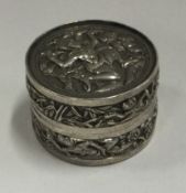 A chased Chinese silver box. Circa 1900.