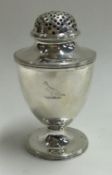 A George III silver pepper. London 1801. By SW.