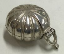 An Antique silver pomander with hinged lid and grill.