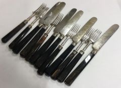 A set of six (plus six) agate handled knives and forks.