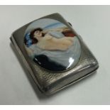 A silver and enamelled cigarette case depicting an erotic scene.