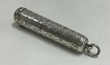 An engraved silver cheroot holder. Birmingham.