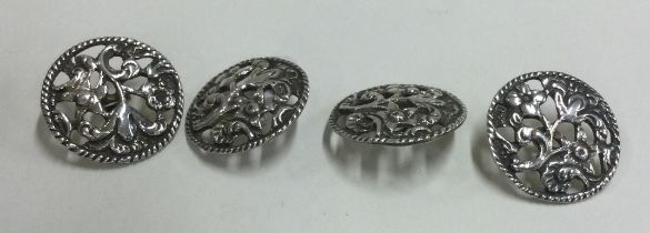 A set of four silver buttons. Birmingham.