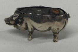 A silver pin cushion in the form of a pig. Birmingham 1905.