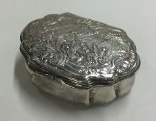 An 18th Century chased silver box. Marked to interior.