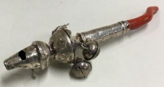 A small Georgian silver rattle with ball decoration.