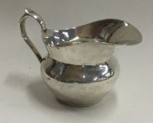 A Chinese silver jug. Marked to base.