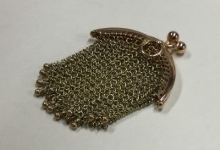 A small Antique 14 carat gold mesh purse.