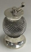 A silver mounted glass pepper grinder. Birmingham.