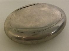 A 19th Century silver squeeze-sided box.