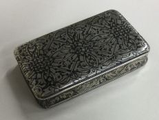 A good Continental silver and enamelled snuff box with scroll decoration.