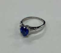 An unusual French sapphire and diamond pear shaped