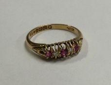 An Antique ruby and diamond seven stone ring.