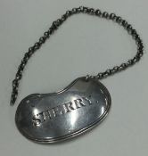 A kidney-shaped silver wine label for 'Sherry'.