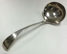A Georgian style OE pattern silver sauce ladle.