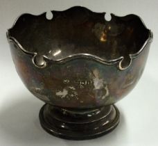 A small silver rose bowl of shaped form. London.