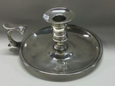 A good quality George II silver chamberstick with removable nozzle. London 1757.