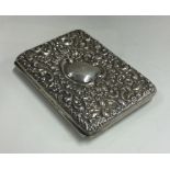 CHESTER: A chased silver card case. 1906.