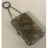 A Continental silver and enamelled purse with suspension chain.