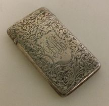 A silver engraved card case. Birmingham 1889.