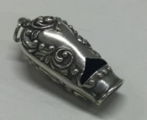 An unusual small silver whistle. Birmingham 1902.
