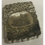 A Victorian engraved silver castle top card case depicting Westminster Abbey.