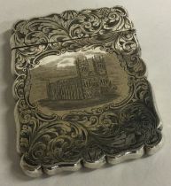 A Victorian engraved silver castle top card case depicting Westminster Abbey.