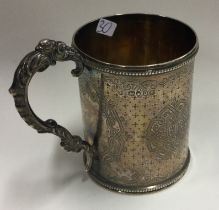 A Victorian engraved silver christening mug.