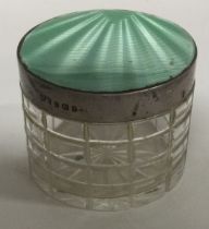 A silver and green glass box. By Mappin & Webb.