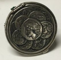 A silver plated coin purse.
