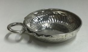 An 18th Century French silver wine taster. Marked to side.