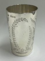 A Victorian silver goblet with engraved decoration. London 1874.