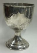 A Victorian engraved silver beaker. London 1890.