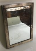 A silver mounted mirror frame. Sheffield 1927.