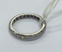 A good diamond full eternity ring set in white gold.