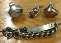 A heavy silver bracelet together with rings etc. A