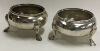 A pair of heavy Victorian silver salts with crested fronts.