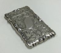 An engraved silver card case. Birmingham 1908. By S&Co.