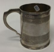 A Georgian silver reeded tankard. 1816.