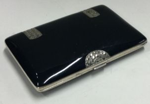 A silver and black enamelled cigarette case decorated with stones bearing import marks.