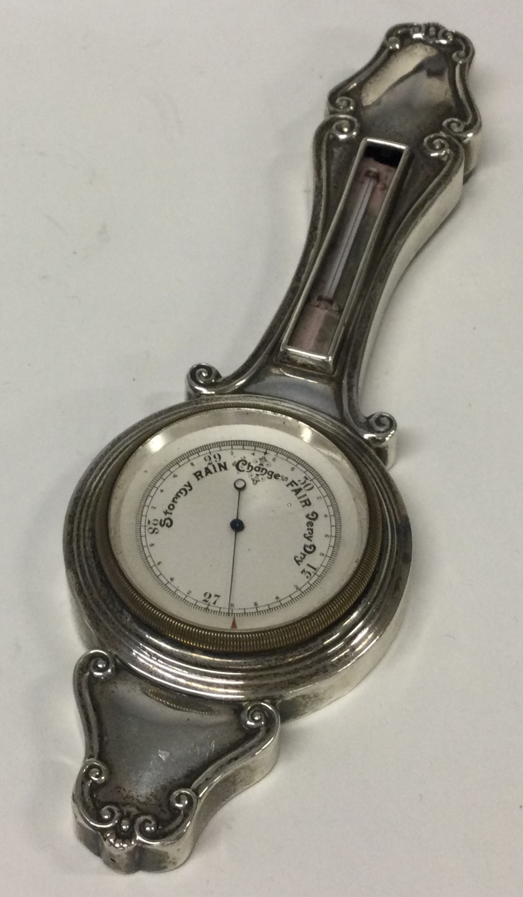 A silver and glass barometer. Birmingham 1901.
