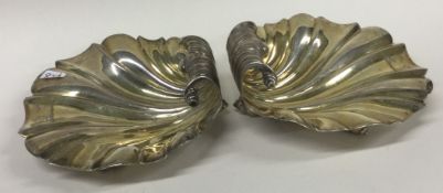 A pair of heavy 18th Century George III silver crested butter dishes. London 1790.