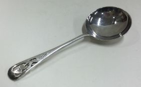 A good large pierced thistle shaped silver caddy spoon.