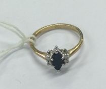 A good diamond and sapphire five stone ring in 9 carat mount.