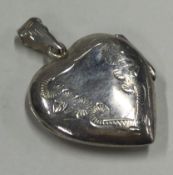 A heart-shaped silver locket.