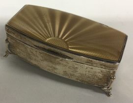 A silver and enamelled jewellery box. Birmingham 1930.
