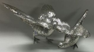 A heavy pair of cast silver pheasants. London 1971.