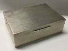 ASPREY & CO: A heavy silver cigar box with engine turned decoration.