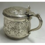 A Victorian silver and glass mustard pot. London 1876.